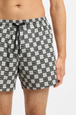 Quick-dry swim shorts with stacked-logo check print, Green