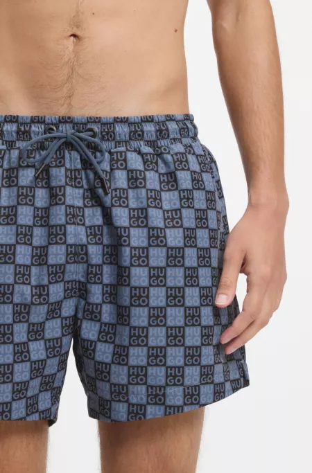 Swim shorts with checkerboard logos