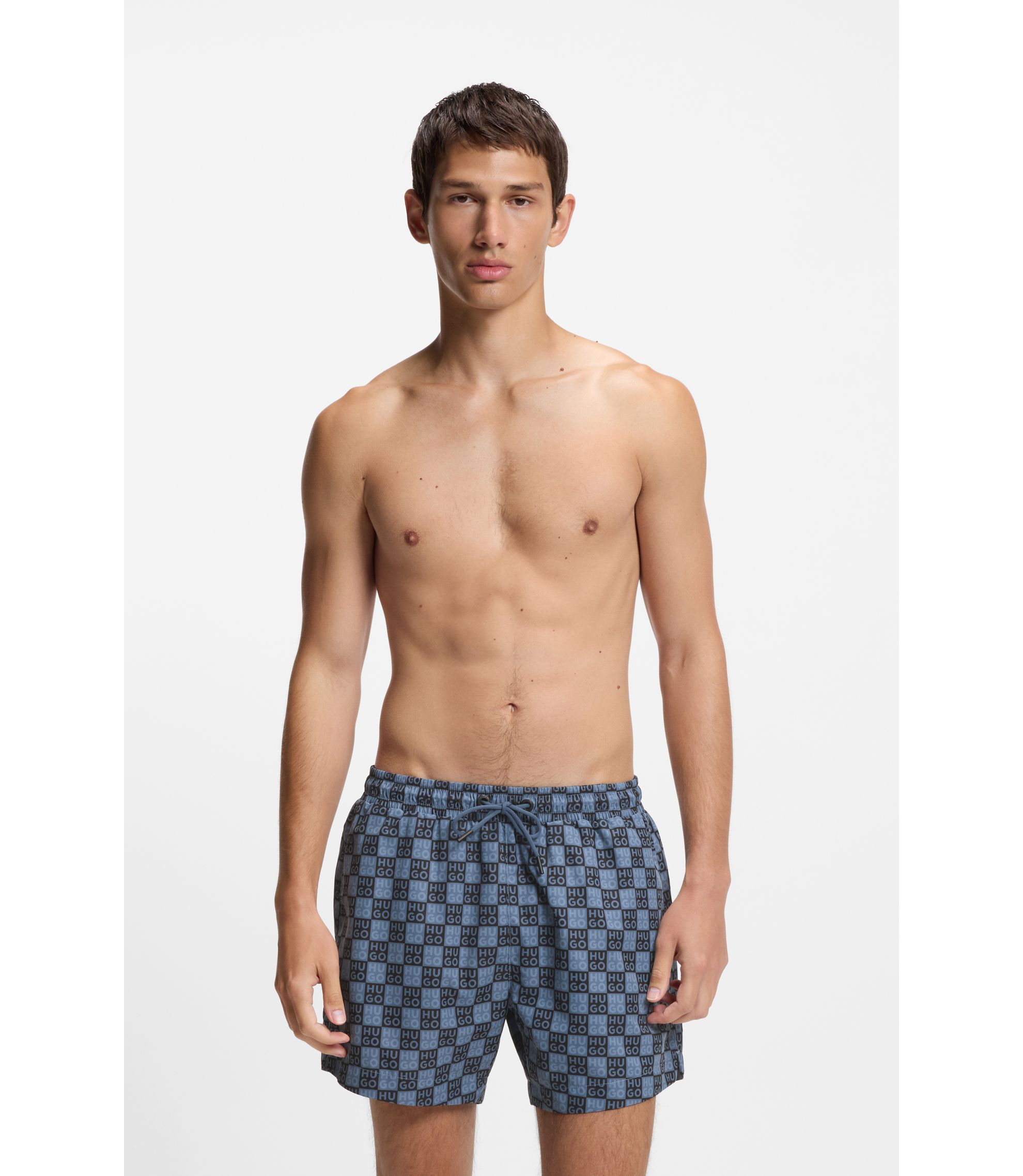 Badeshorts mit Schachbrett-Logos