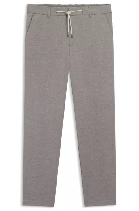 Pantalones tapered fit con cordón en la cintura
