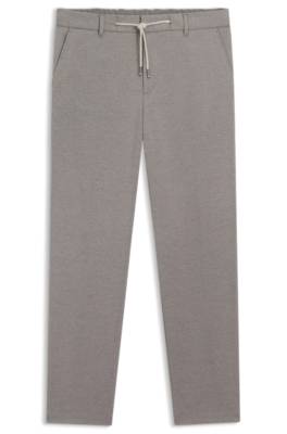 Tapered-fit trousers with reversible drawstring 1