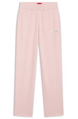 Tracksuit bottoms in stretch jersey with red logo label 4