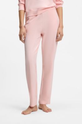 Tracksuit bottoms in stretch jersey with red logo label, Light Pink