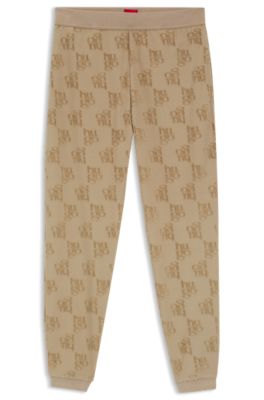 Trainingsbroek met all-over-logopatroon van katoenmix, Lichtbruin