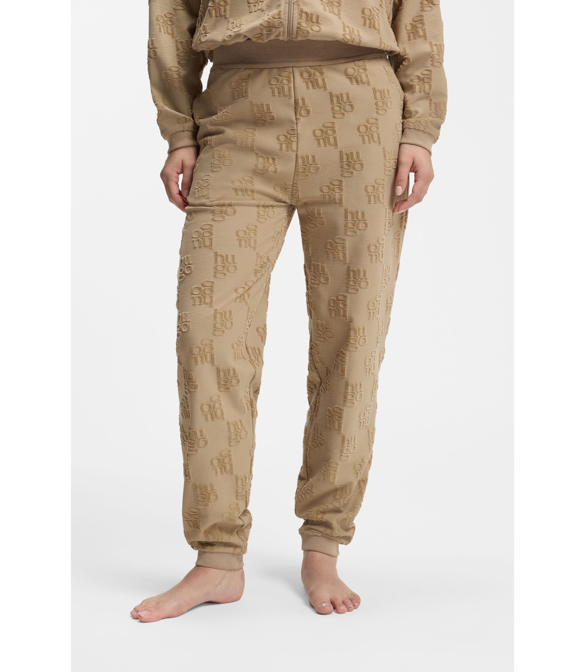 Jogginghose aus Baumwoll-Mix mit Allover-Logo-Muster