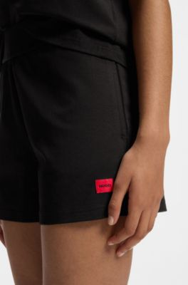 Regular-fit loungewear bottoms in stretch fabric, Black