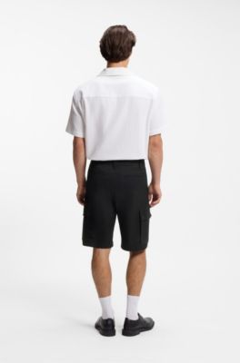Shorts cargo in cotone elasticizzato con pieghe sulla parte anteriore, Nero