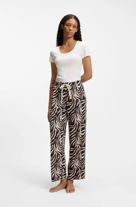 Pantalones de pijama de punto elástico con estampado integral