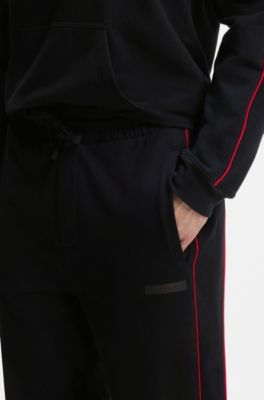 Stretch-cotton tracksuit bottoms with contrast piping, Black