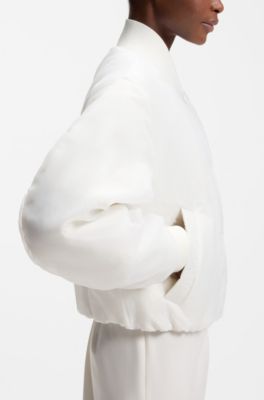 Water-repellent jacket with chiffon overlay, White