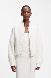 Water-repellent jacket with chiffon overlay, White