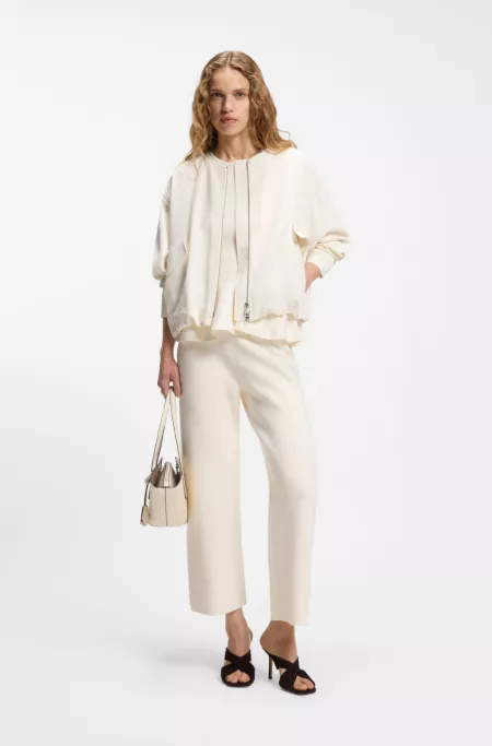 Ärmelloses Top mit Schößchen-Saum