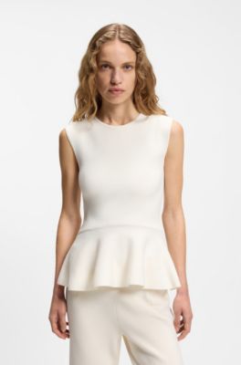 Sleeveless top with peplum hem, White