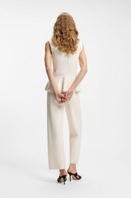 Sleeveless top with peplum hem, Natural