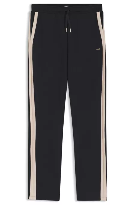 Tapered-fit tracksuit bottoms with contrast inserts