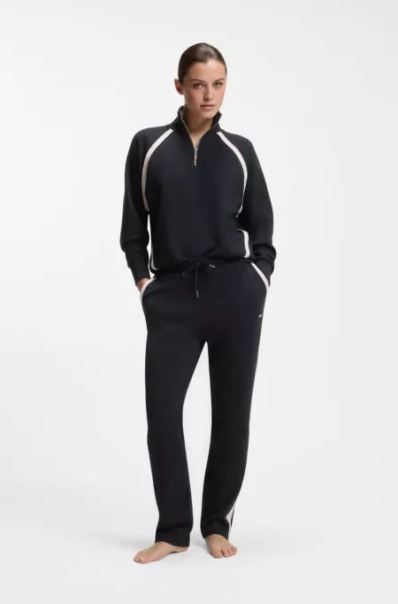 Tapered-fit tracksuit bottoms with contrast inserts