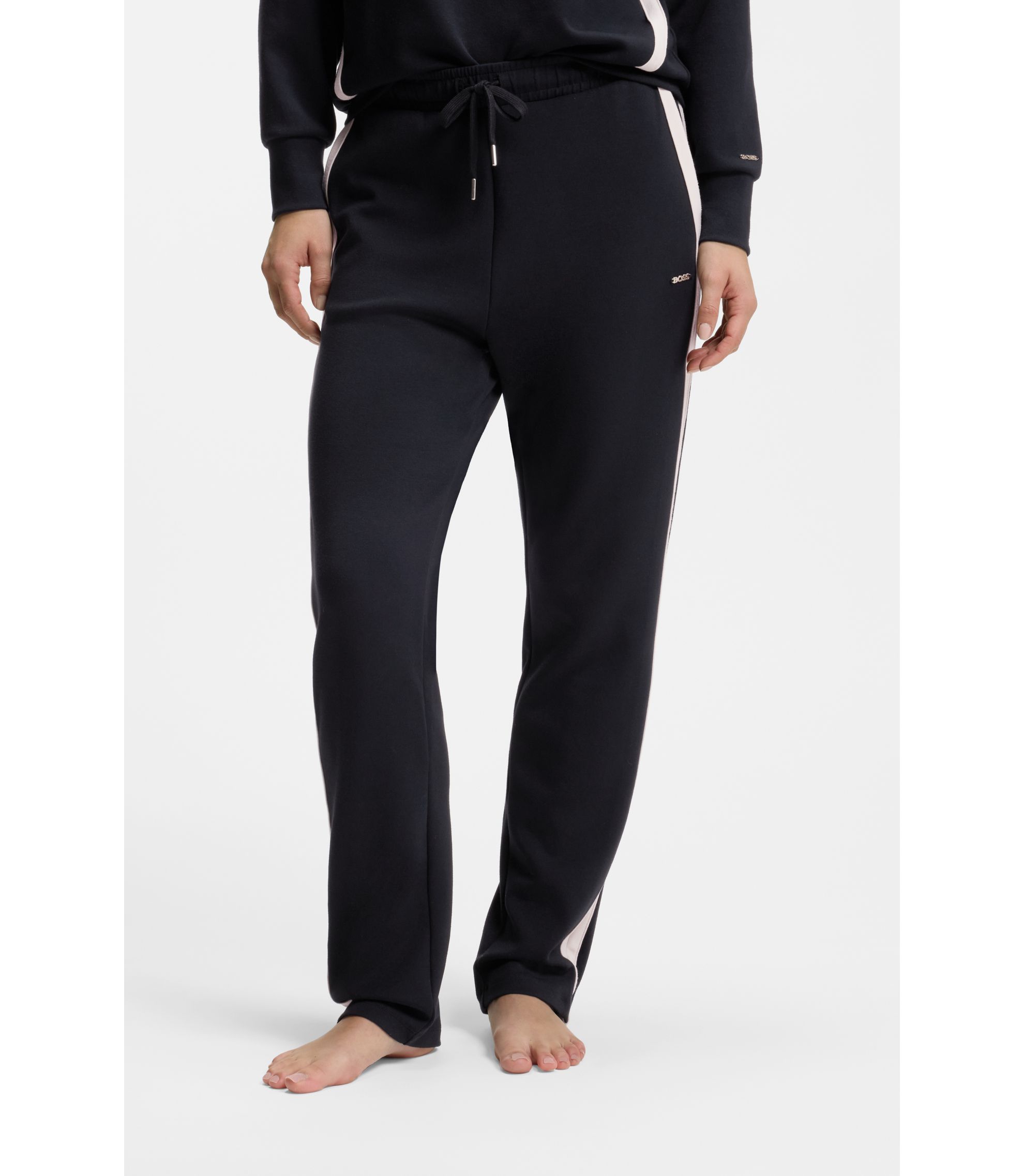 Schmal geschnittene Jogginghose mit kontrastierenden Einsätzen