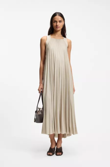 Halterneck dress with plissé pleats