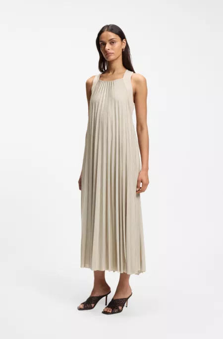 Halterneck dress with plissé pleats