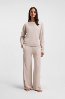 Melange-jersey tracksuit bottoms with logo plate, Light Beige
