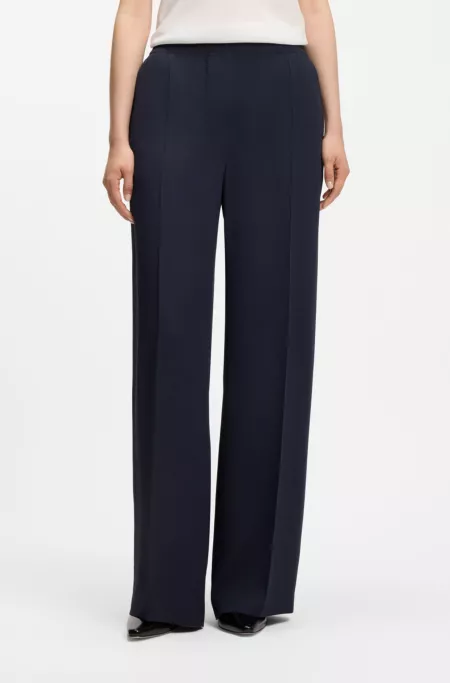 Relaxed-fit trousers in fluid crepe