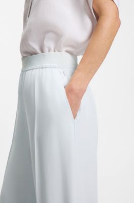 Pantaloni relaxed fit in cr&ecirc;pe fluido, Celeste