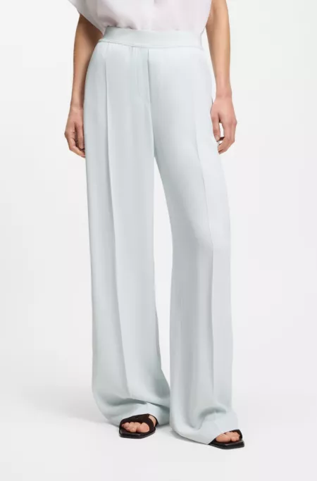 Relaxed-fit trousers in fluid crepe