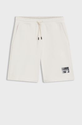Cotton-terry shorts with tortoiseshell logo, Natural