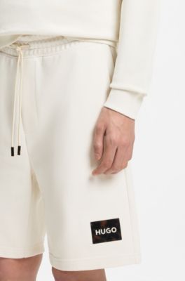 Cotton-terry shorts with tortoiseshell logo, Natural