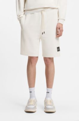 Cotton-terry shorts with tortoiseshell logo, Natural