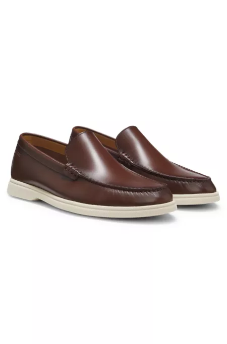 Leather moccasins with embossed logo