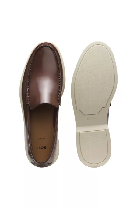 Leather moccasins with embossed logo