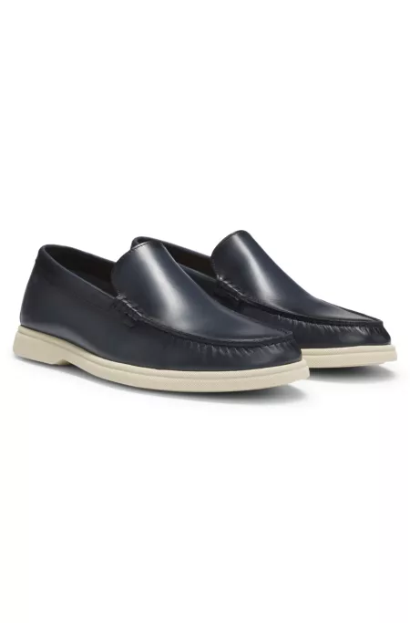 Leather moccasins with embossed logo