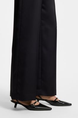 Mules con tal&oacute;n abierto en piel cepillada, Negro