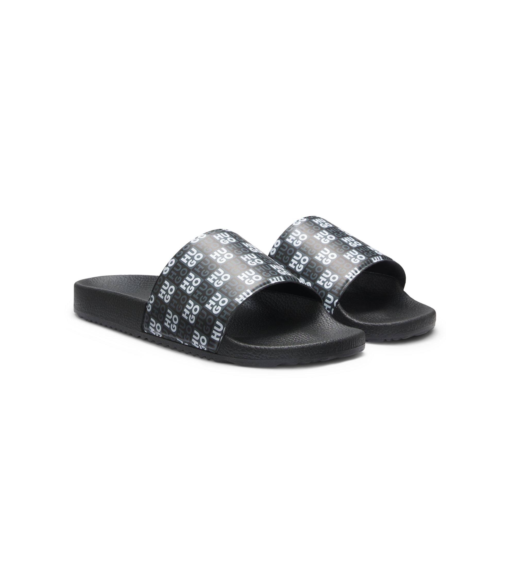 In Italien gefertigte Slides mit Stack-Logo am Riemen