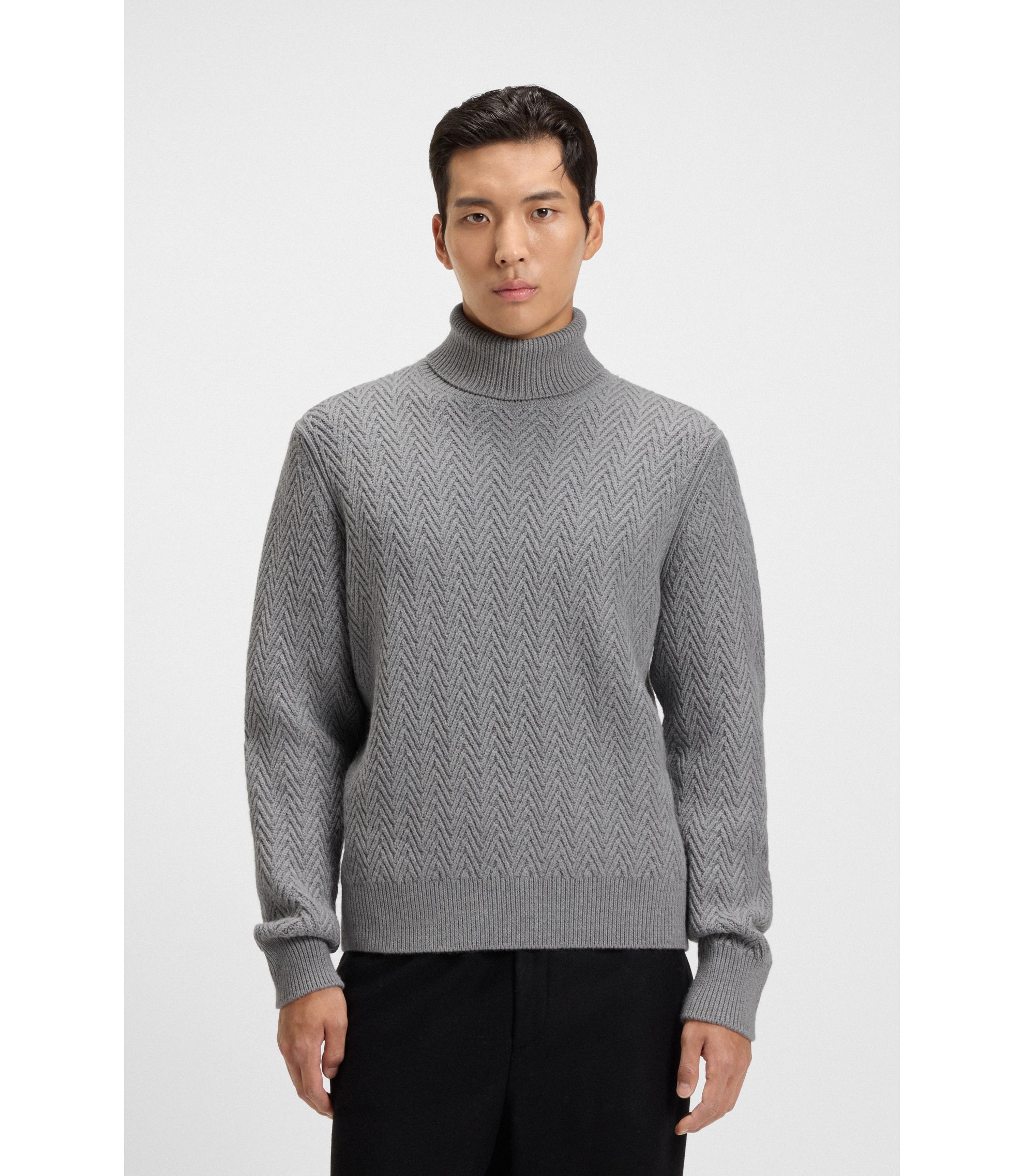 Rollkragenpullover aus Schurwolle mit Fischgrätmuster