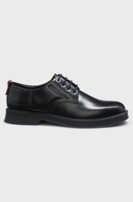 Derbys aus Leder mit Gummisohlen, Schwarz