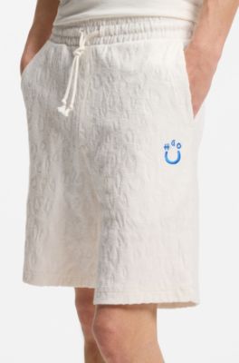 Short en coton &eacute;ponge avec jacquard l&eacute;opard, Naturel