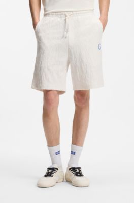 Cotton-towelling shorts with leopard jacquard, Natural