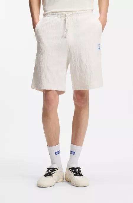 Cotton-towelling shorts with leopard jacquard