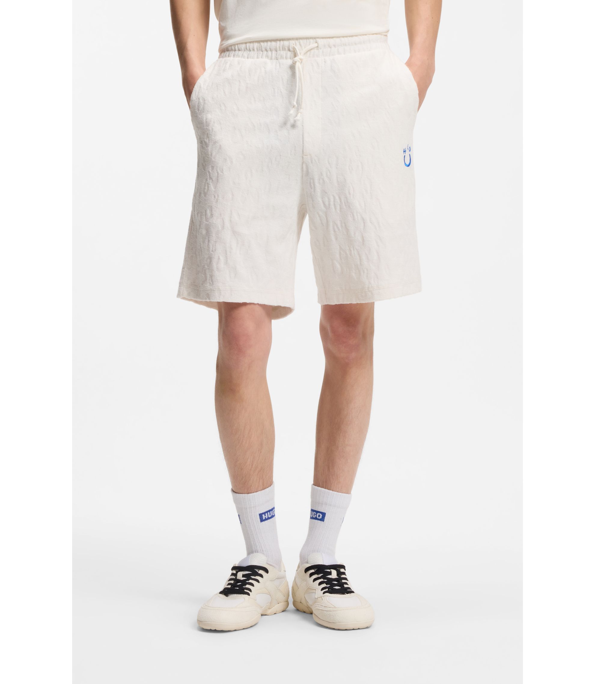 Shorts aus Baumwoll-Frottee mit Leopard-Jacquard