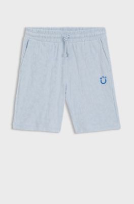 Shorts i bomuldsfrott&eacute; med leopardjacquard, Lysebl&aring;