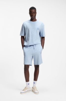 Shorts in spugna di cotone con jacquard leopardato, Celeste
