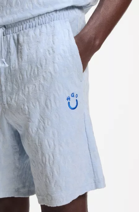 Cotton-towelling shorts with leopard jacquard