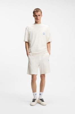 T-shirt van katoenen badstof met Happy HUGO, Naturel