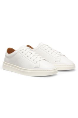 Low-top trainers in leather with embossed logo, White