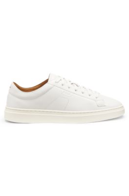 Low-top trainers in leather with embossed logo, White