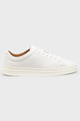 Low-top trainers in leather with embossed logo, White