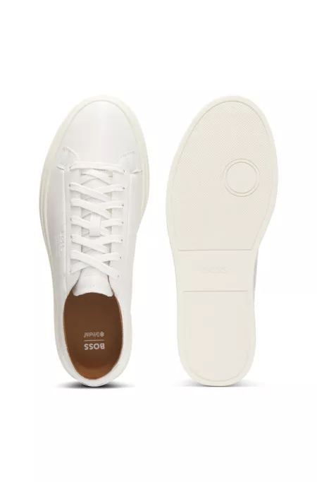 Low-top trainers in leather with embossed logo