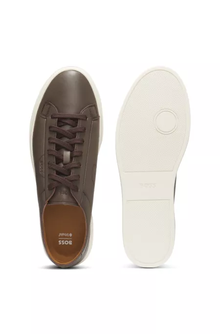 Low-top trainers in leather with embossed logo